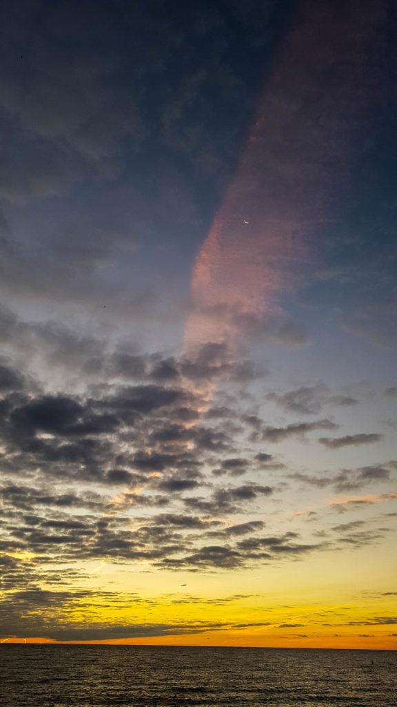Moon and Venus with Contrail and Sunrise